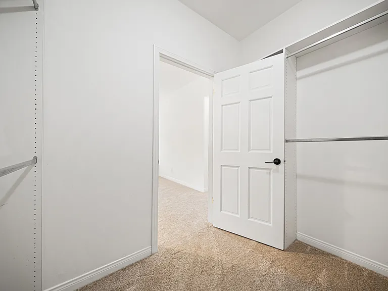 Primary Bedroom Walk-In Closet
