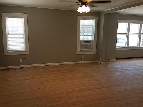 Open living room flows to large dining room.
