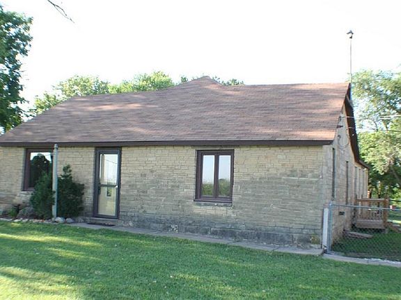 Front of House
						:
						Do not let the front of the house deceive you, the house is long & roomy inside!