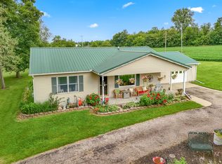 5980 Beecher Rd, Osseo, MI 49266