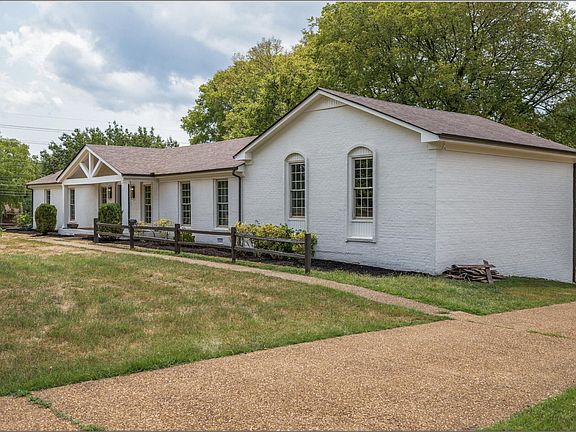 pending shutters, landscape and porch swing!