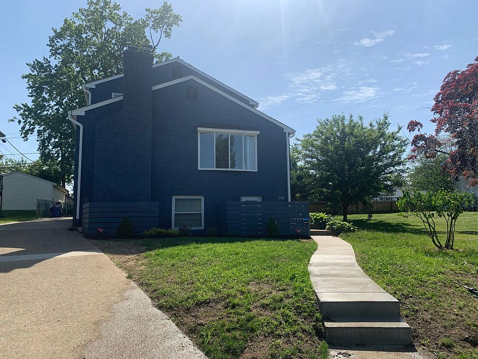 Left Side of House and Driveway