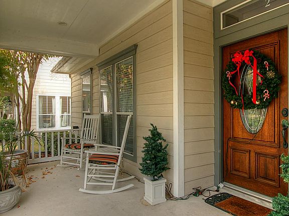 Large inviting covered front porch.