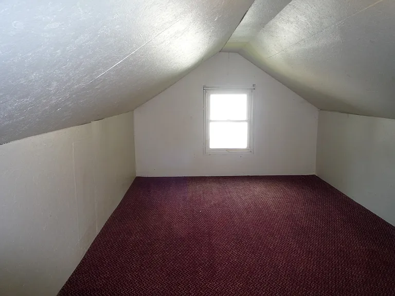 Upstairs attic - no sleeping here but excellent storage or work room