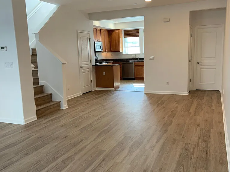 Spacious living and dining areas with new flooring!