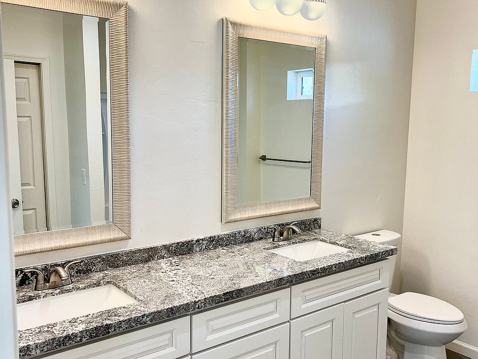 This is 1 of 2 huge bathrooms with double sinks