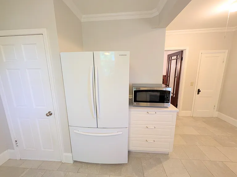 View from kitchen sink, with access to laundry room.