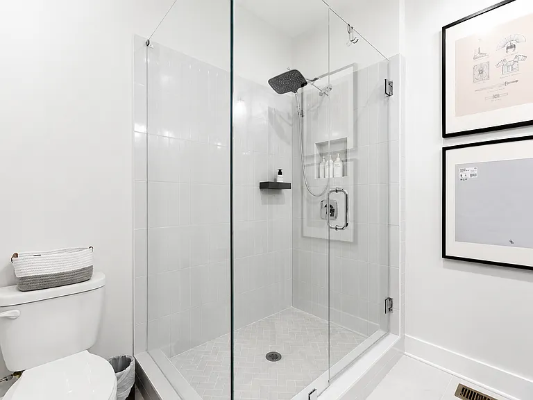 2nd view of en suite owner's bathroom with upgraded showerhead