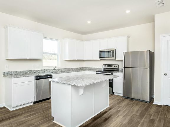 Package A Kitchen with beautiful white cabinets and granite countertops - Model Representation