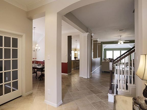Grand entry, impressive tall ceilings! Study on the left. Open with a great flow. Arch entry defines