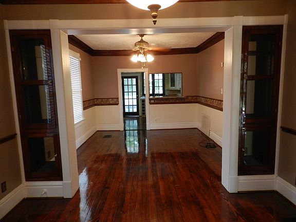 Looking at Dining room and kitchen beyond