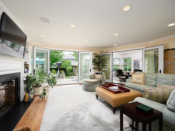 Full of light and boasting heated floors, the family room addition is the heart of the home.