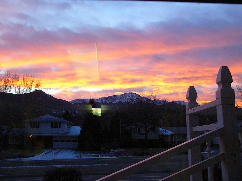 Sunset behind Pike's peak from family room window