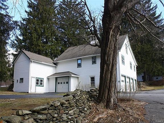 Carriage house with original antique barn and loft.
