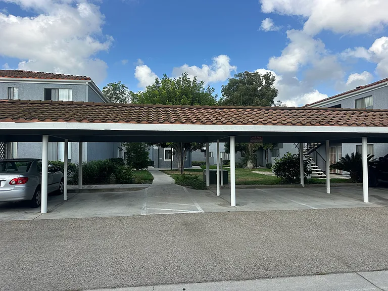 Front building carport parking.