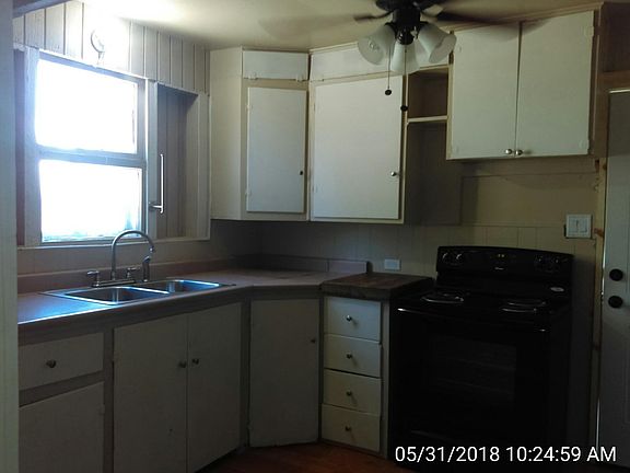 Kitchen has an electric range