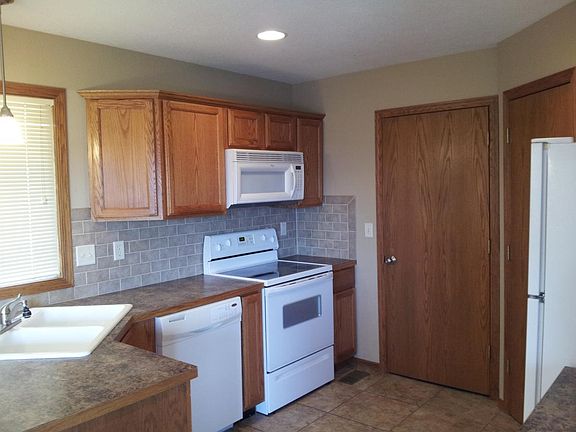 Kitchen with pantry and access to laundry