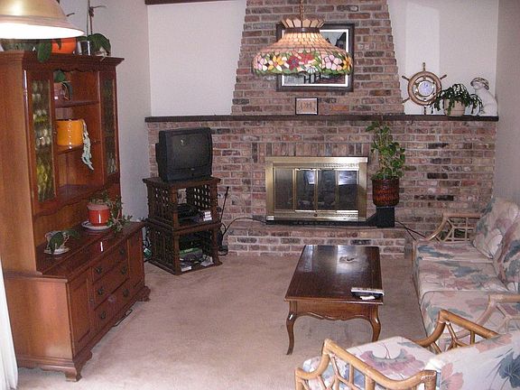 Family Room Features a Fireplace