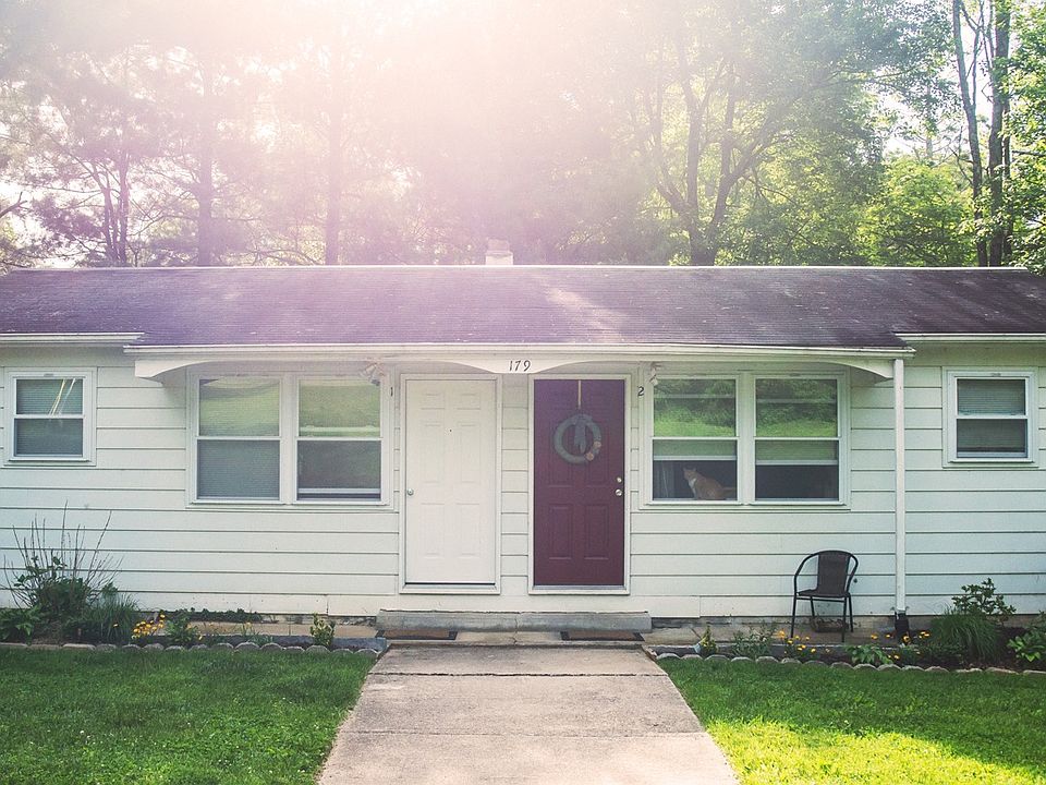 the door on the left will be painted soon. The red door is t