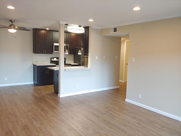 Spacious, open floor plan. Go right down the hall to reach the bedroom and bathroom.