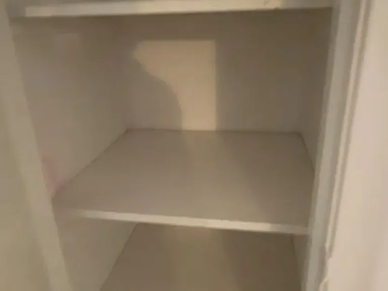 Freshly painted linen closet