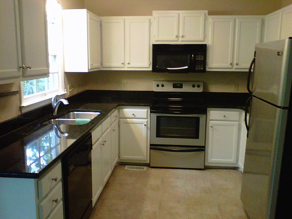 Kitchen with granite and stainless.