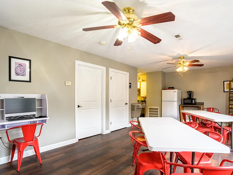 Bright, welcoming community space with workstations and seatingideal for studying, remote work, or friendly gatherings right at your doorstep.