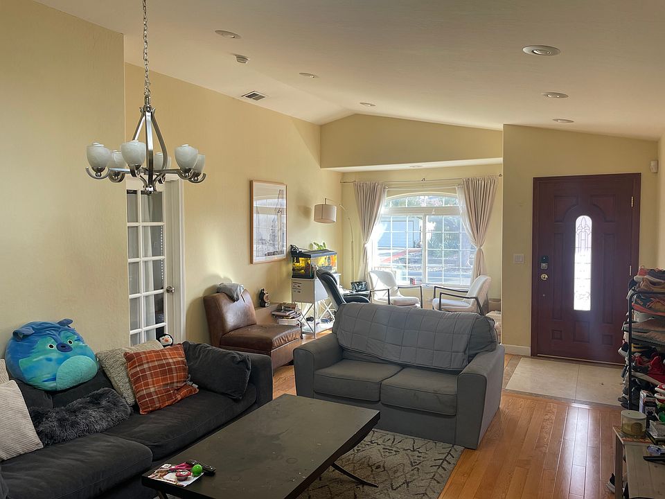 great room with sofa, TV, coffee table, etc.