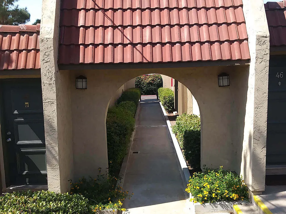 Transition walkway between buidings at Teton Pines Apartments in Escondido, California.
