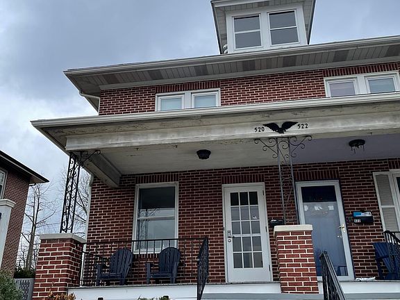 Front of apartment. Living space is on the second floor.