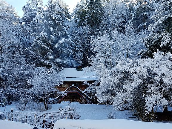 Previous House Against Ridge