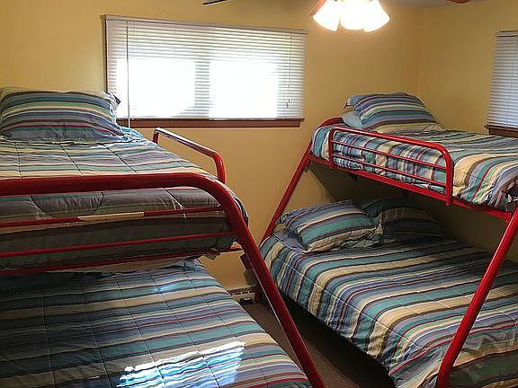 Bedroom sleeps 6 with bunks.