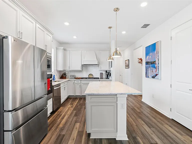 9454 Ballaster Pointe Loop — Photo 12