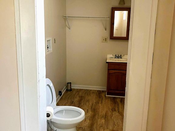 Downstairs half bath with washer dryer hookup