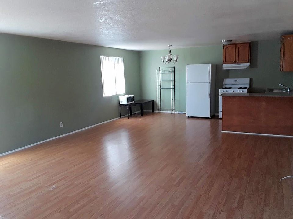 Living room opening up to the dicing room and kitchen
