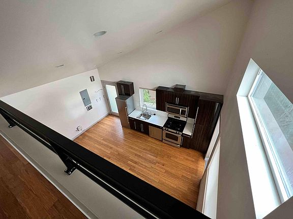 view of kitchen from master bed loft