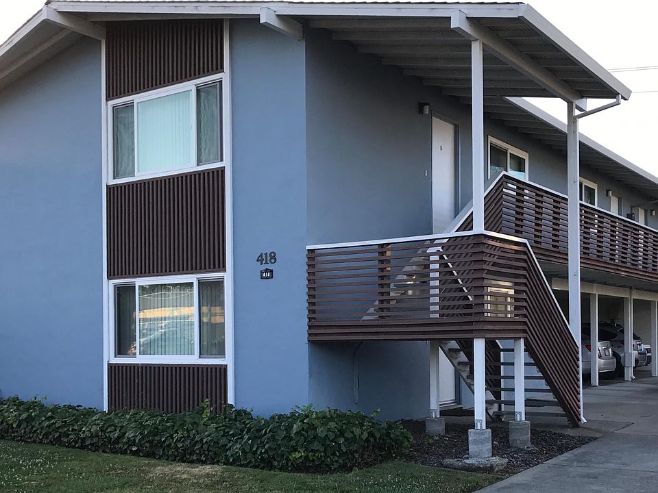 The apartment for rent is situated upstairs and in the front, of this 4-unit building with a sunny east-west exposure.