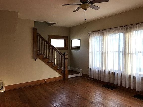 Decorative staircase in living room.