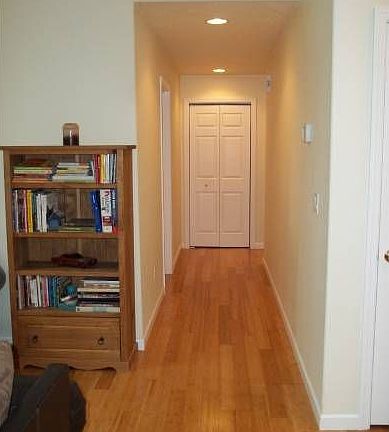 Hallway to three bedrooms
