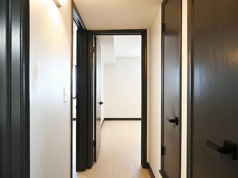 Hallway with black trim at Cielo 120.
