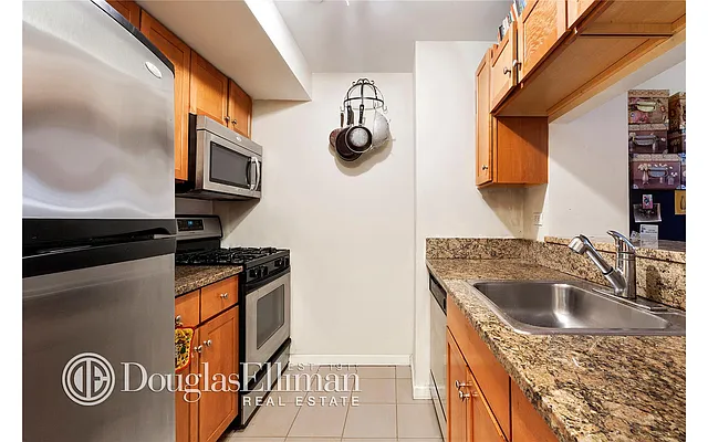 Sold by Douglas Elliman | media 13