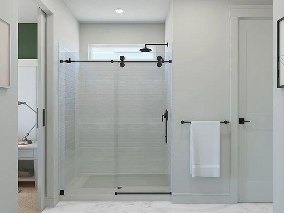 Primary bath with glass shower enclosure