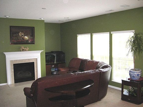 Cozy family room with a gas-log fireplace.