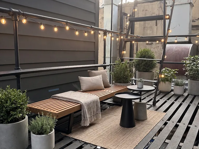LARGE FIRE ESCAPE THAT YOU CAN MAKE YOUR OWN PRIVATE OASIS.