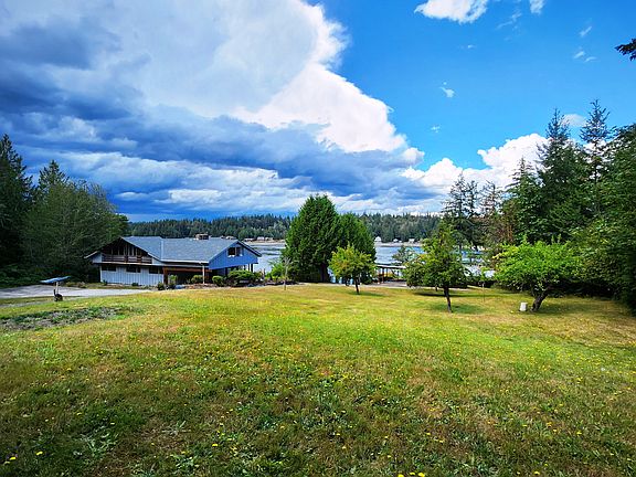 Blue house on left. Private living with only 3 homes down a private driveway.