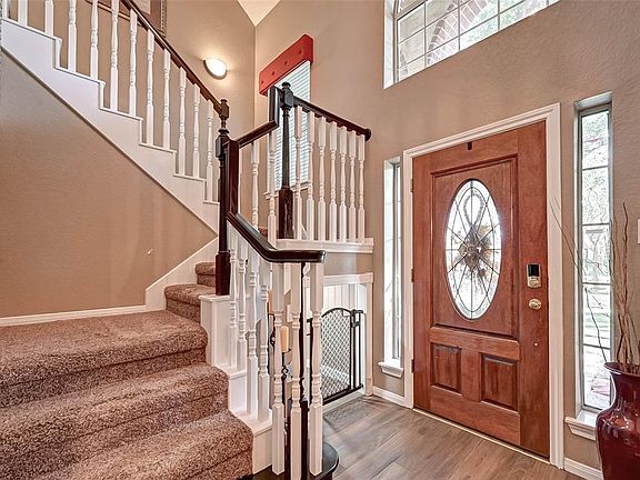 Come inside to a 2-story foyer...don't miss the under stairs extra storage or kennel!