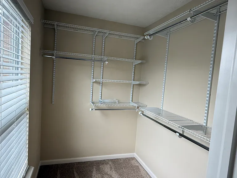 The third of the upstairs bedrooms has a walk in closet.