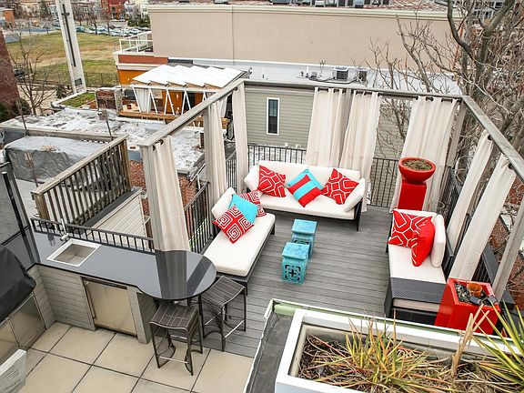 Incredible roof deck with living area and outdoor kitchen