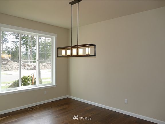 4th image of 4419 Caddyshack Drive NE Lot56
