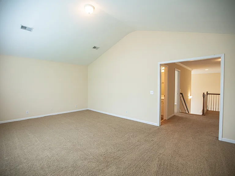 Upstairs offers a spacious loft/bonus room ideal for a media room, game room, or entertainment area with endless possibilities.